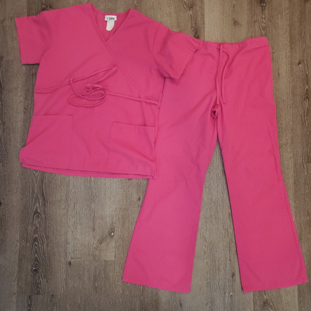 Life uniform pink scrubs. Shirt is a small pants are medium